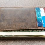 Wallet - Brown Leather Wallet and Us Dollar Banknote